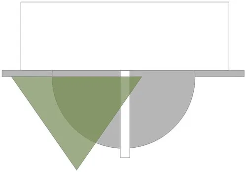 Close-up of a miter saw's angle scale and locking knob, with the pointer set to forty-five degrees on a metal base.